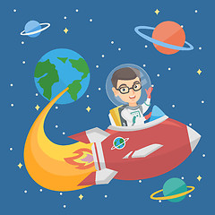 Image showing Caucasian smiling boy riding a spaceship.