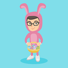 Image showing Boy in rabbit suit with the basket of easter eggs.