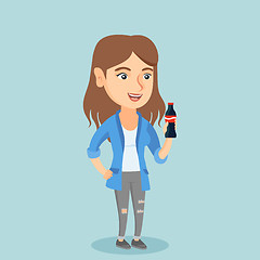 Image showing Young caucasian woman drinking soda.