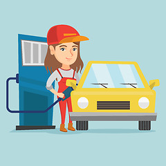 Image showing Caucasian worker of gas station refueling a car.