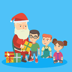 Image showing Santa claus giving presents to a group of kids.