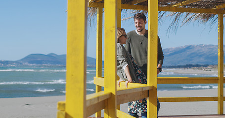 Image showing Couple chating and having fun at beach bar