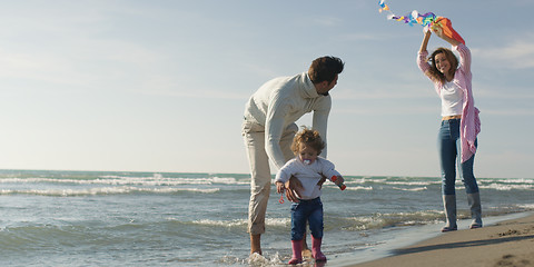 Image showing Young family enjoying vecation during autumn