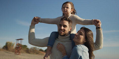 Image showing Young family enjoying vecation during autumn