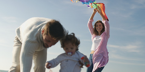 Image showing Young family enjoying vecation during autumn