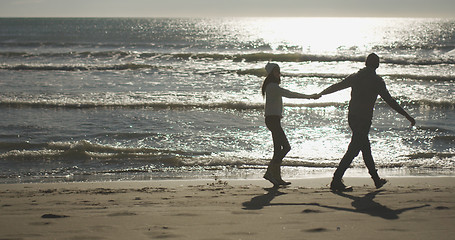 Image showing Romantic Couple Relaxing On The Beach