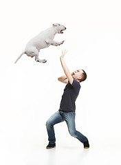 Image showing Emotional Portrait of a man and his Bull Terrier dog, concept of friendship and care of man and animal