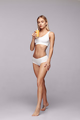 Image showing Perfect slim toned young body of the girl .