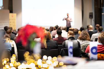 Image showing Business speaker giving a talk at business conference event.