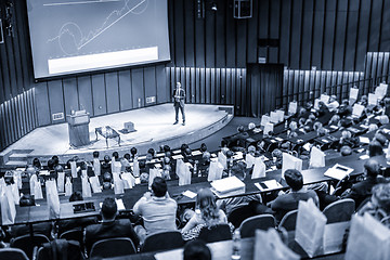 Image showing Speaker giving presentation on business conference event.