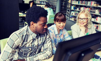 Image showing international students with computers at library