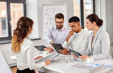 Image showing team of recruiters with tablet pc at job interview