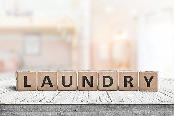 Image showing Laundry sign on a white table