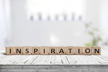 Image showing Inspiration sign on a wooden table