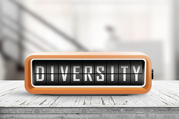 Image showing Diversity word on a retro device on a wooden table