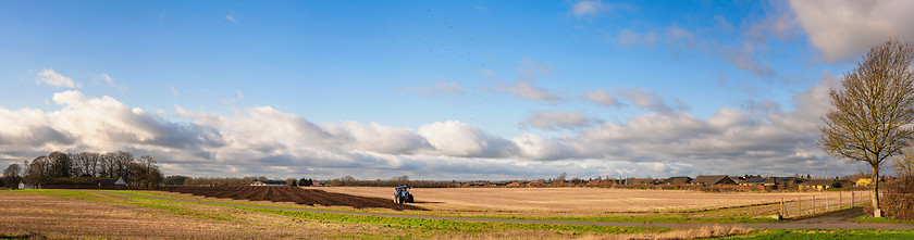 Image showing Tractor in a rural panorama landscape