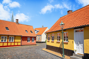 Image showing Street with yellow buildings and cooblestone