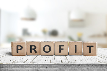 Image showing Profit sign in a bright room on a wooden table