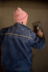 Image showing Worker plastering the wall by concrete