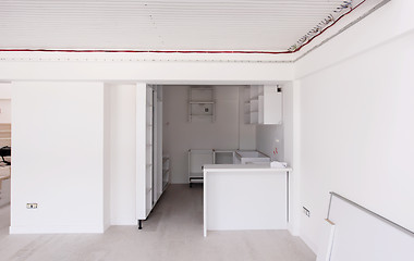 Image showing Interior of empty stylish modern open space two level apartment