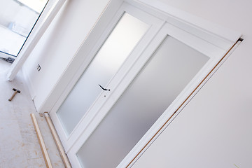 Image showing double glass door with white wooden frame