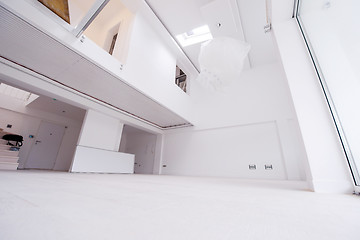 Image showing Interior of empty stylish modern open space two level apartment