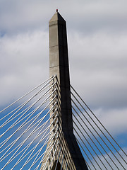 Image showing Detail of bridge support with clouds and blue sky