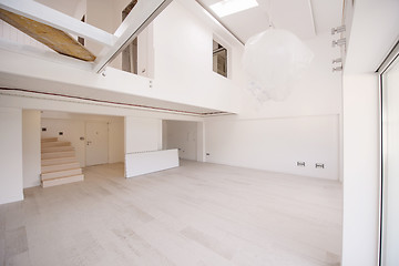 Image showing Interior of empty stylish modern open space two level apartment