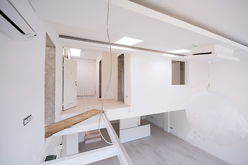 Image showing Interior of empty stylish modern open space two level apartment