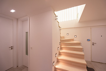 Image showing stylish interior with wooden stairs