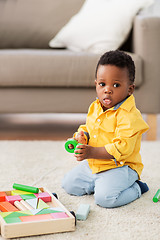 Image showing african american baby boy playing with toy blocks