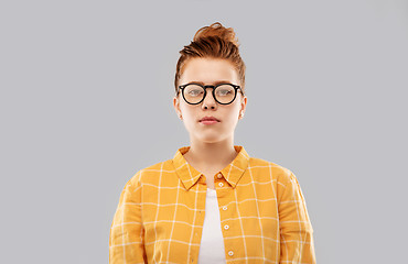 Image showing red haired teenage student girl in glasses