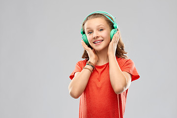 Image showing happy teenage girl with headphones