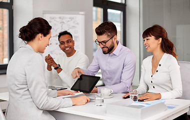 Image showing team of recruiters with tablet pc at job interview