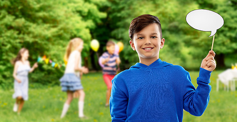 Image showing smiling boy with speech bubble at birthday party