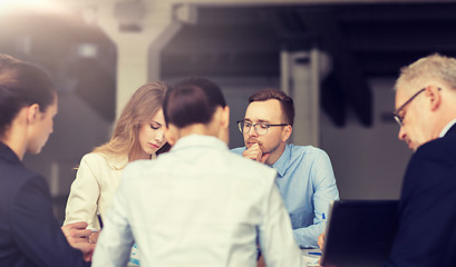 Image showing smiling business people meeting in office