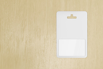 Image showing Blank gift card on wooden table