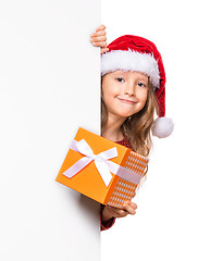 Image showing Christmas child showing board