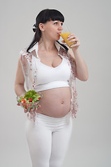 Image showing Pregnant woman and healthy food