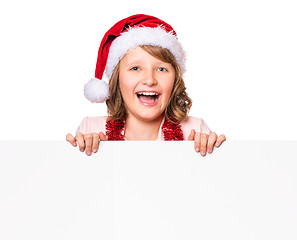 Image showing Christmas child showing board