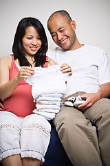 Image showing Happy expecting asian couple