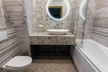 Image showing Interior of a stylish modern bathroom in the apartment