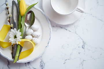 Image showing Spring Easter Table setting at white marble table. Top view