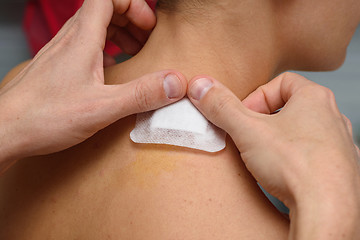 Image showing A medical patch is pasted on the wound