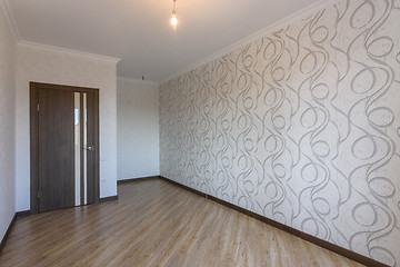 Image showing The interior of the future room after renovation with wallpaper on the walls