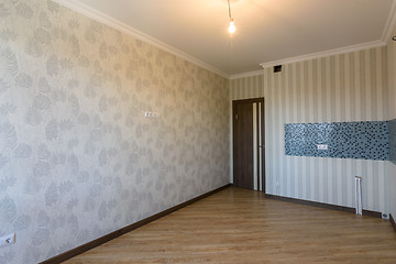 Image showing Interior of renovated living room without furniture, place for kitchen headset