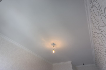 Image showing Lined plastered ceilings in a rectangular room after renovation