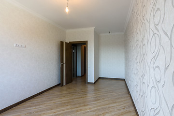 Image showing Exit to the balcony from the future bedroom in the interior of the empty room