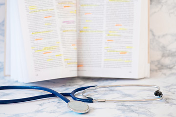 Image showing Stethoscope and book