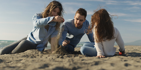 Image showing Young family enjoying vecation during autumn